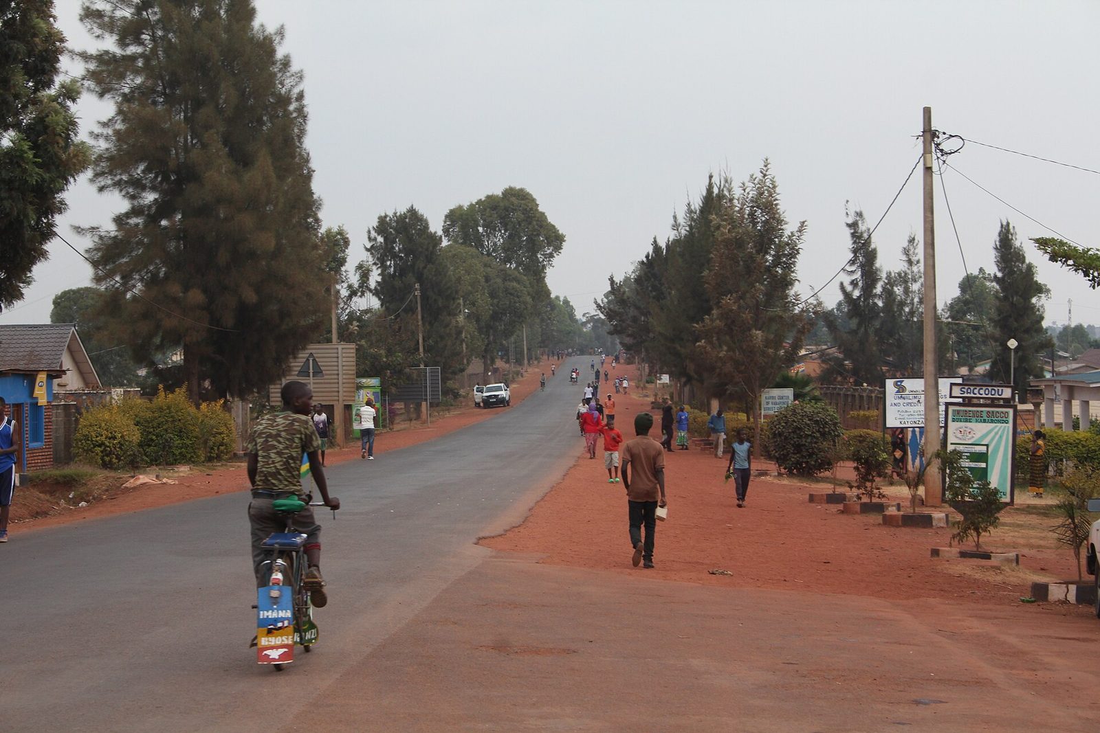 Savannah and a red road heading east from Kayonza